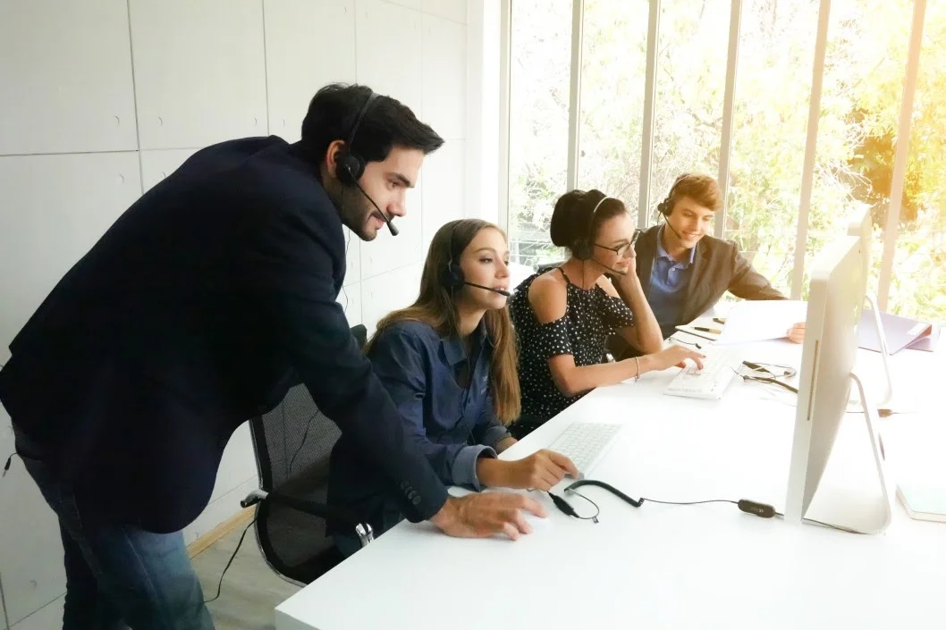 portion of smiling women customer service